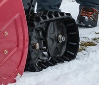 Telamallinen lumilinko rinteisiin ja epätasaiselle pihalle